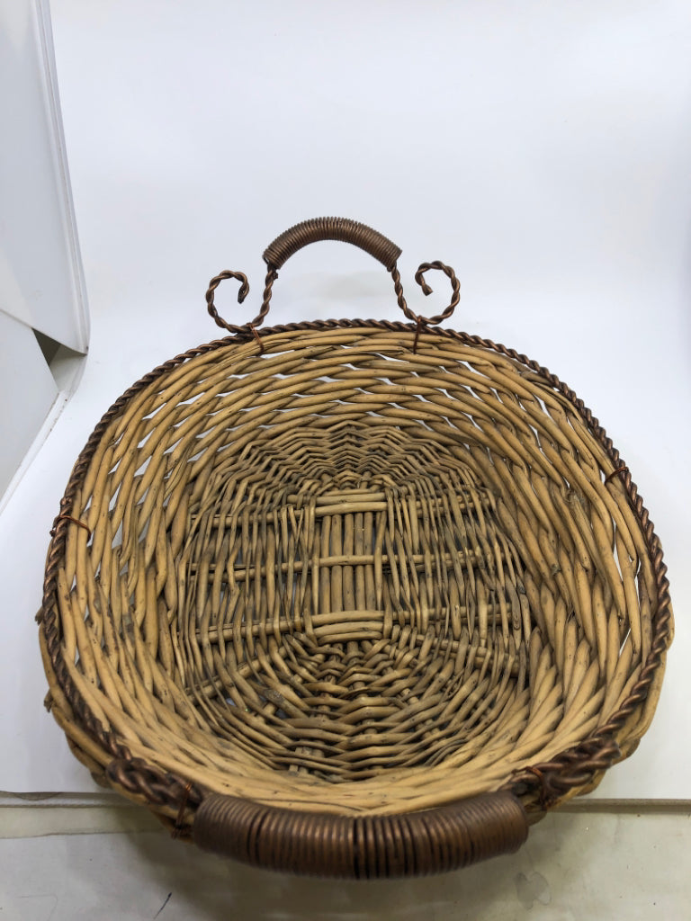 WICKER BASKET W/DECORATIVE METAL HANDLES.