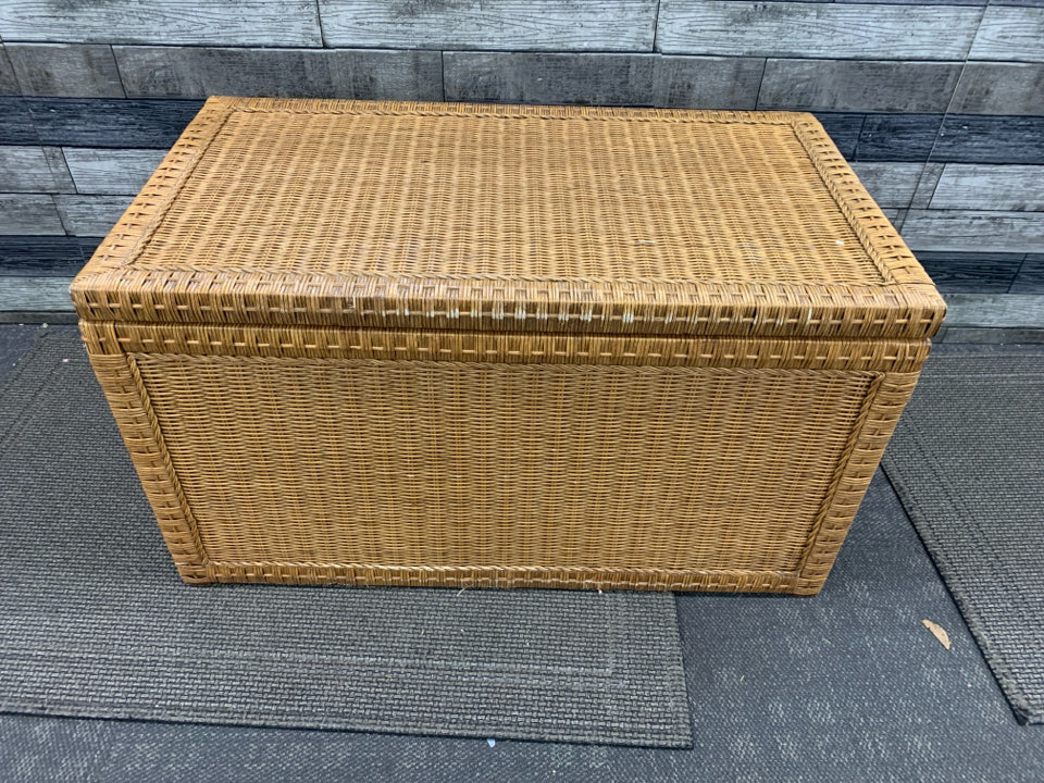WICKER STORAGE CHEST W/METAL HANDLES.