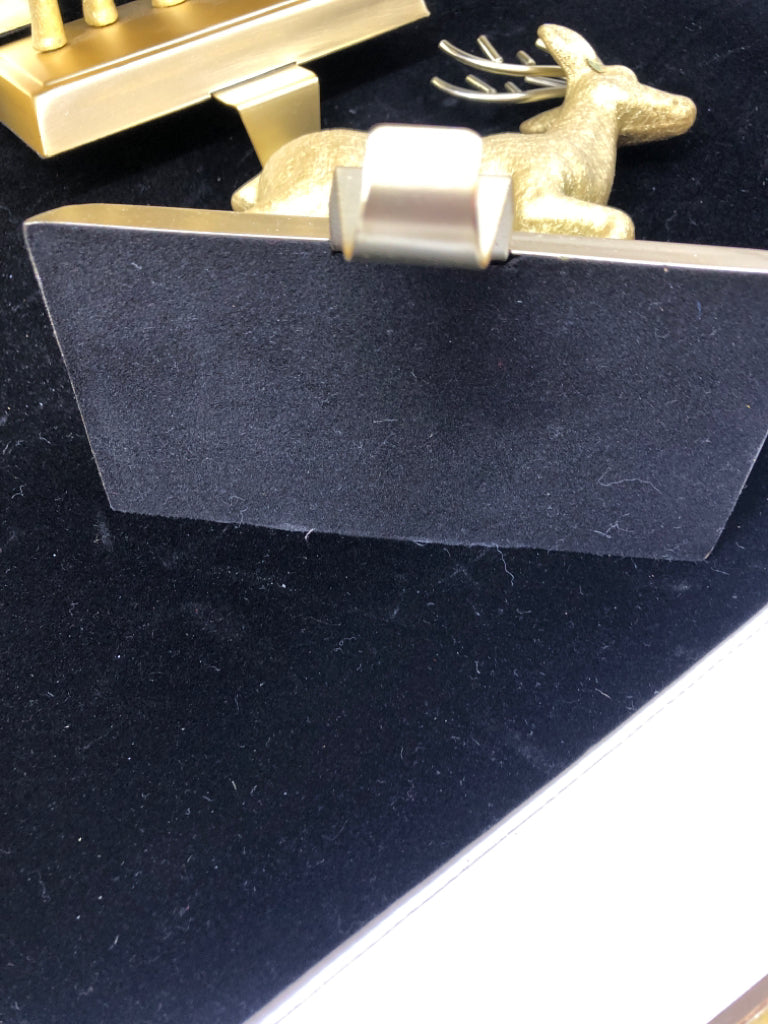 4 GOLD DEER STOCKING HOLDERS.