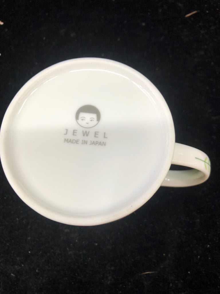 GREEN LITTLE GIRLS FACE MUG.
