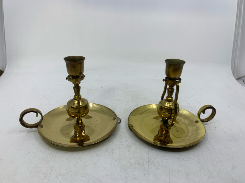 2 SELF LEVELING BEDSTICK CANDLE HOLDERS.