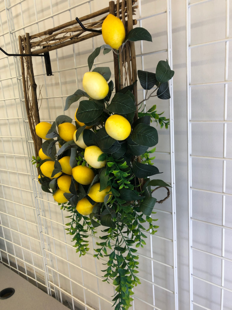 TWIG FRAME WITH PLASTIC LEMON & LEAF DECOR.