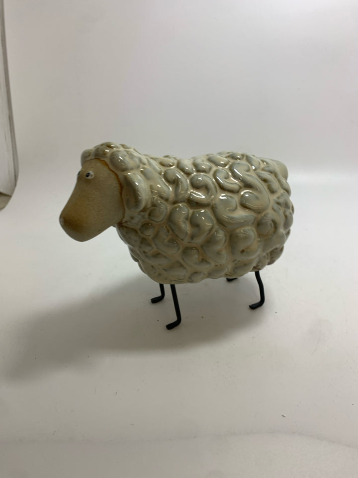 GLAZED SHEEP DECOR W/METAL LEGS.