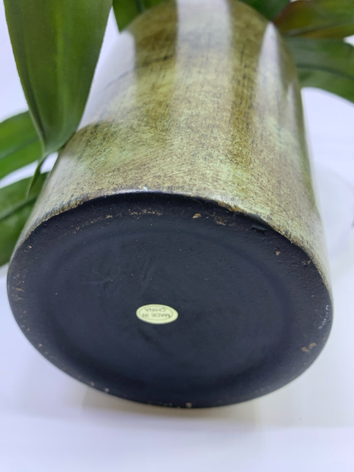 FAUX RED PLANT IN PLANTER.