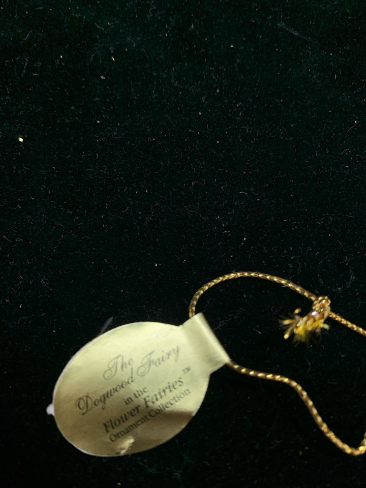 THE DOGWOOD FAIRY PORCELAIN ORNAMENT.