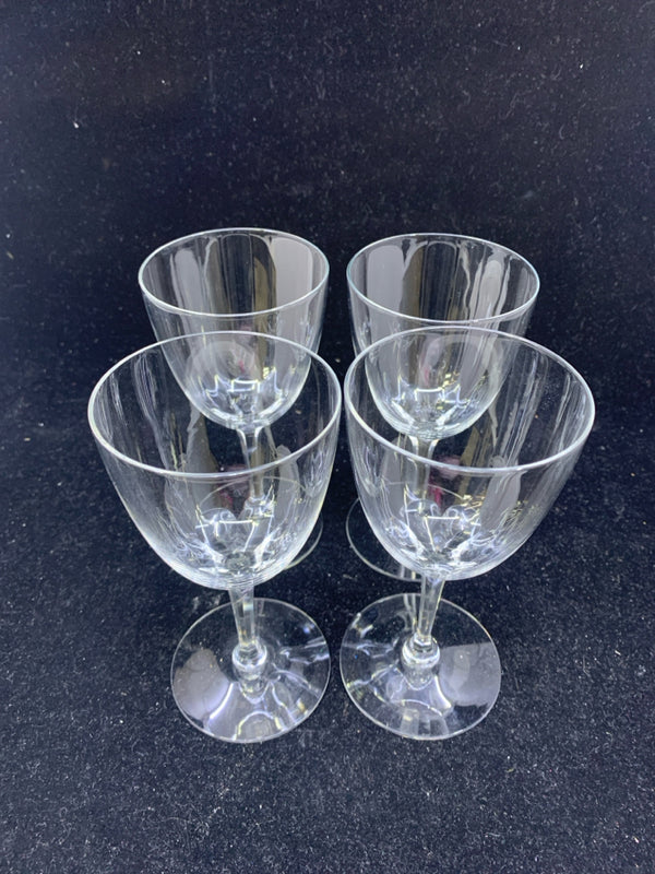 4 SMALL FOOTED BRANDY GLASSES.