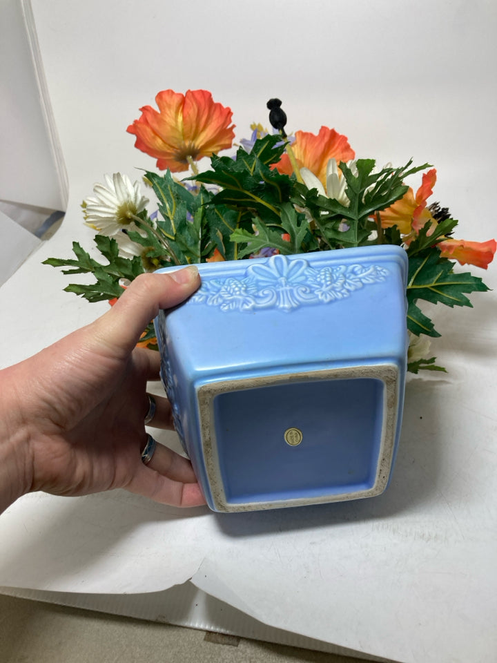 BLUE PLANTER W/ ASSORTED WILD FLOWERS.