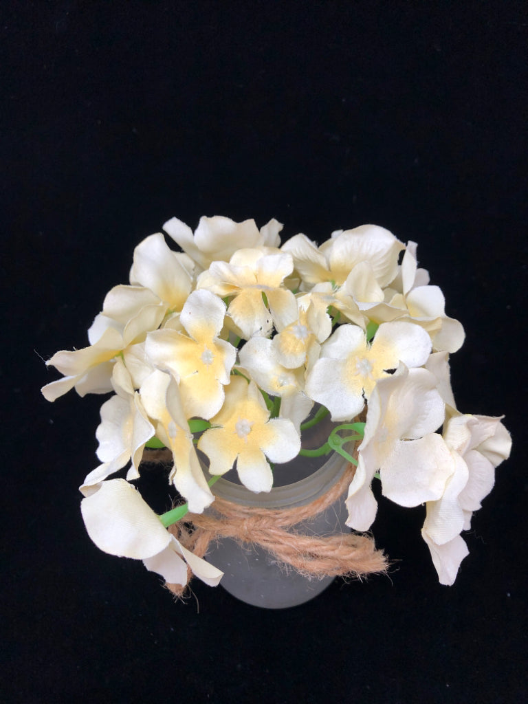 FAUX YELLOW FLORALS IN FROSTED GLASS.