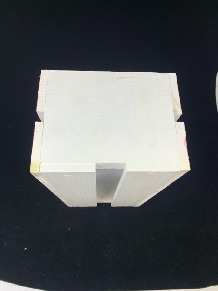 PINK AND WHITE DECORATIVE CRATE.
