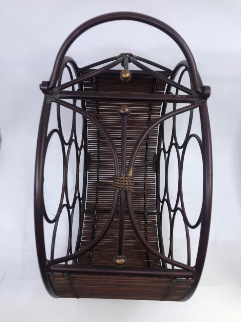 FOOTED BROWN WINE RACK CIRCULAR METAL.