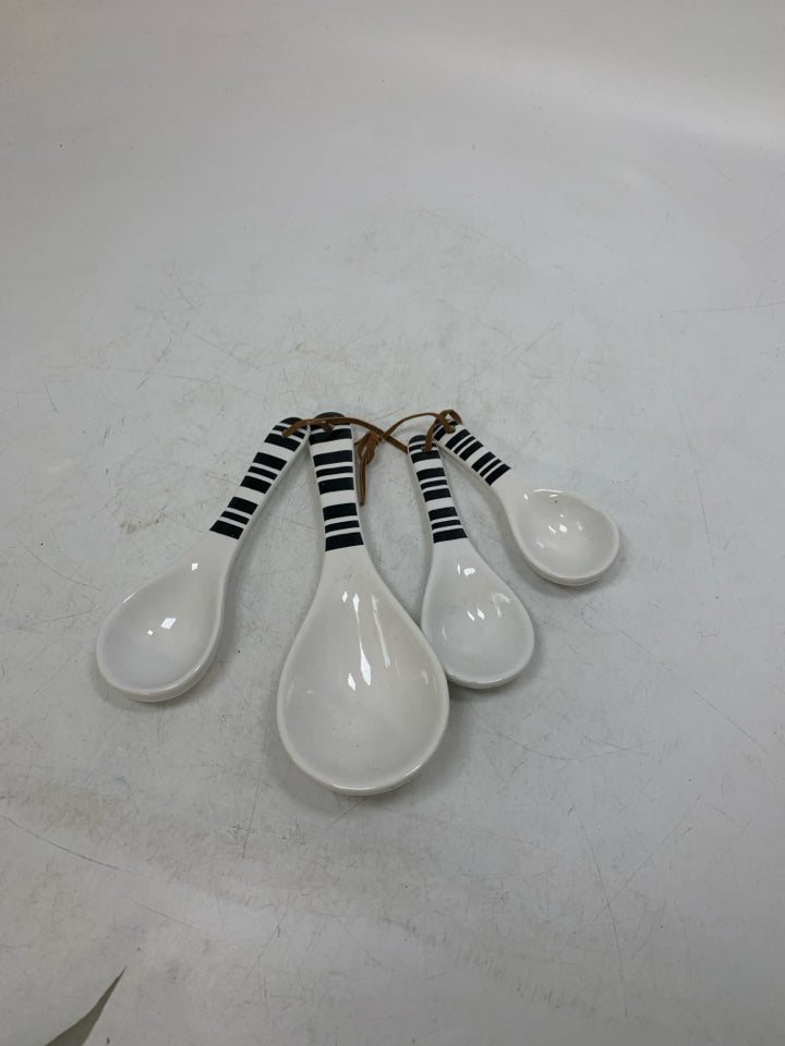 4 CERAMIC MEASURING SPOONS.