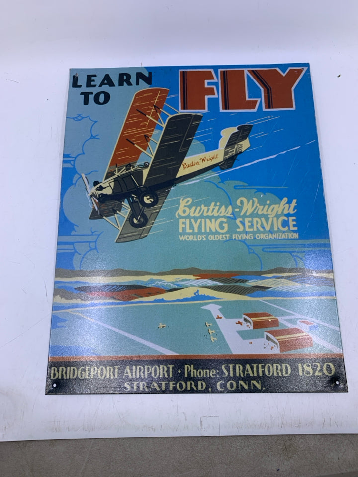 METAL LEARN TO FLY SIGN.