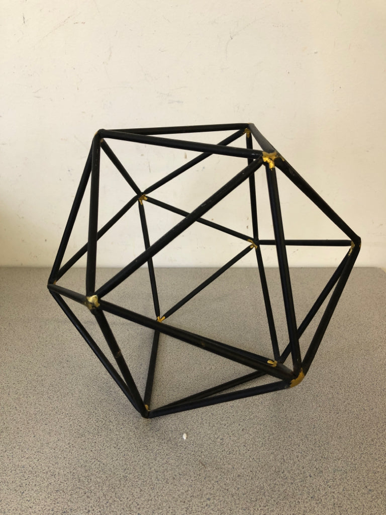BLACK HEXAGON DECOR W/GOLD POINTS.