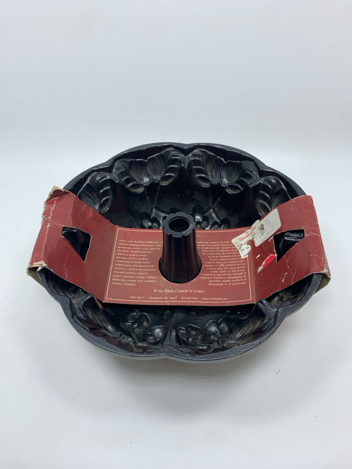 NORDIC WARE VIOLET BUNDT PAN.