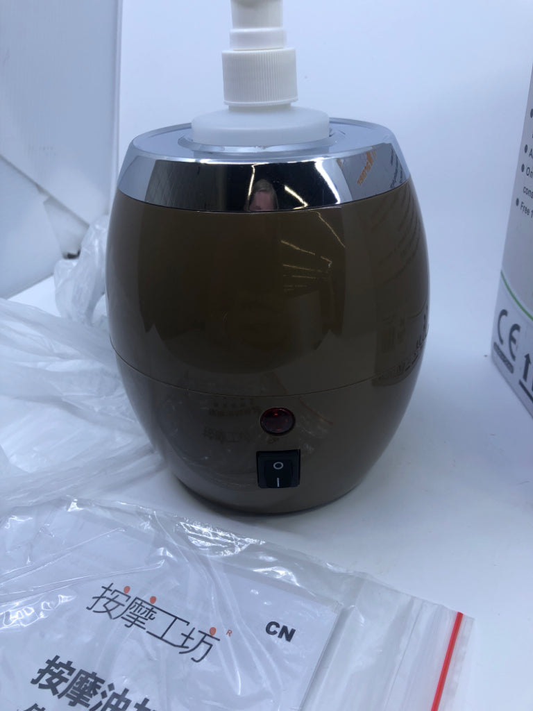 NIB MESSAGE OIL WARMER.