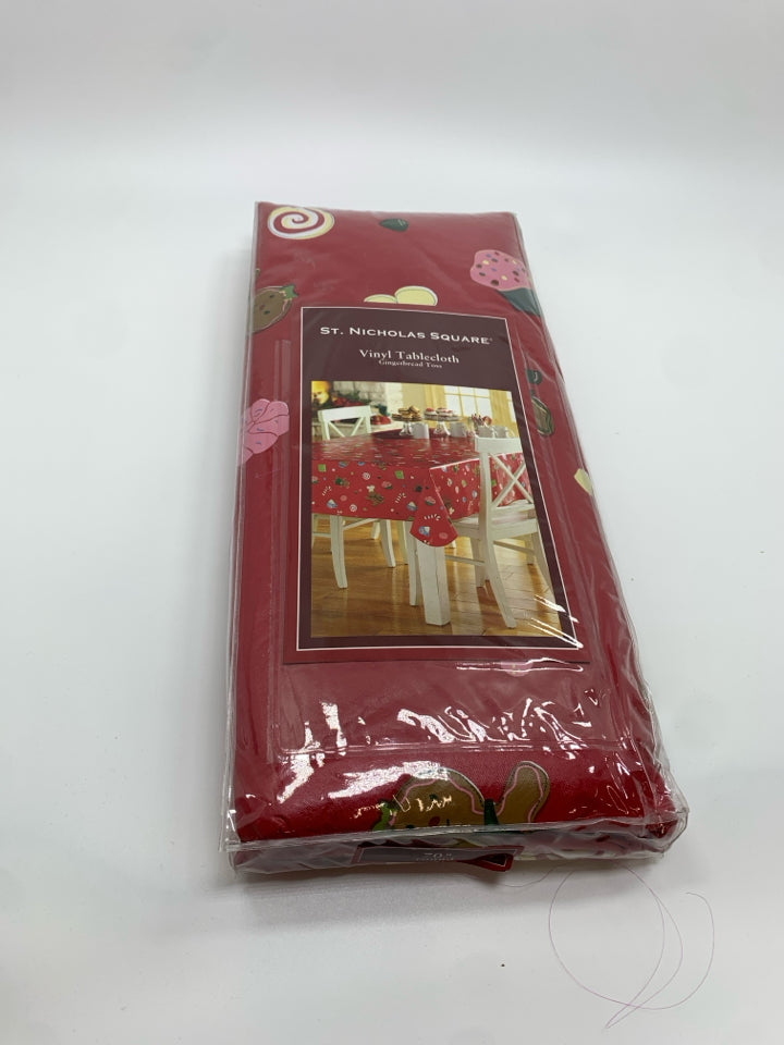 NIP GINGERBREAD TOSS VINYL TABLECLOTH.
