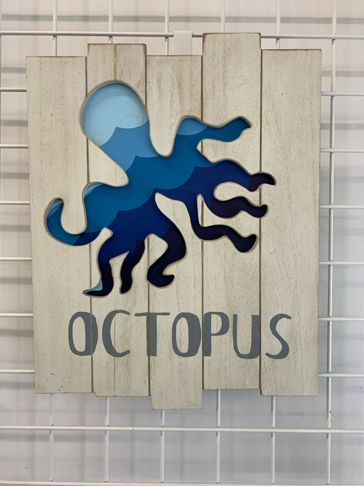 WOOD CUTOUT OCTOPUS WALL HANGING.