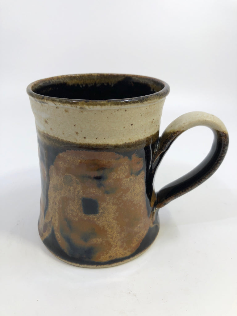 CREAM POTTERY MUG W/ BROWN&BLACK DESIGN.