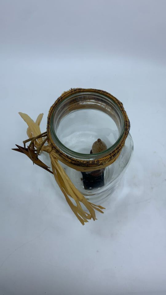 MASON JAR W/SM LED CANDLESTICK AND METAL STARS.