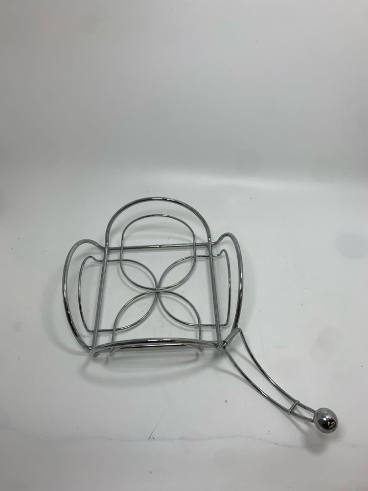 SILVER METAL NAPKIN HOLDER.