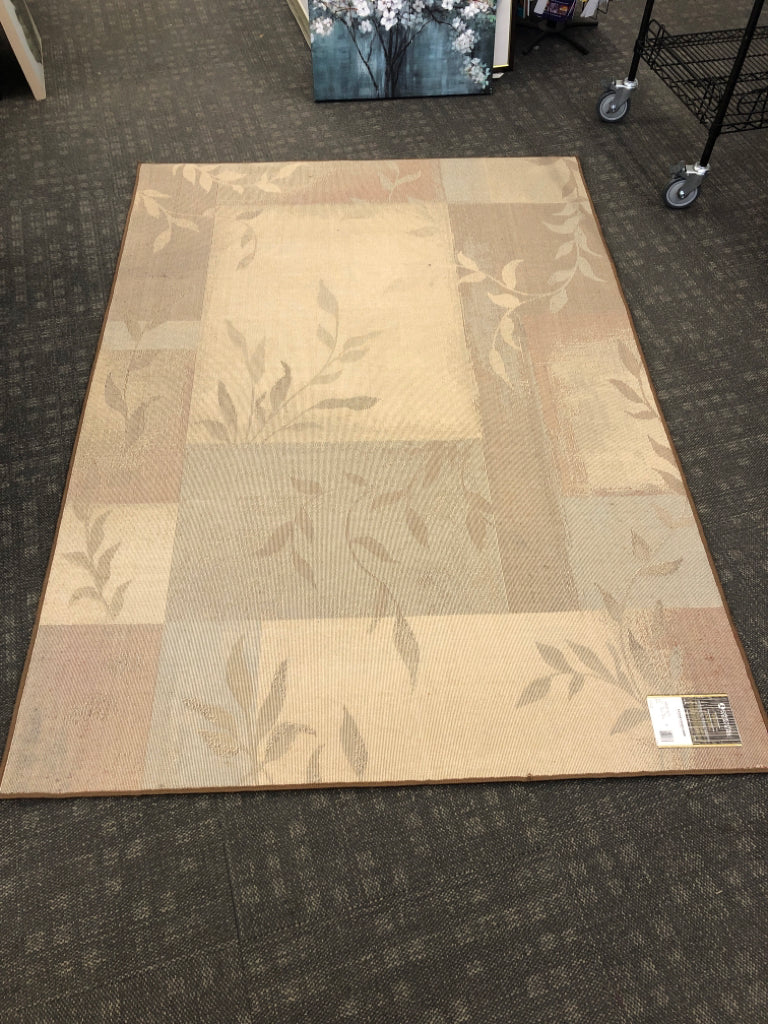 MULTICOLORED RUG W/LEAVES BROWN, RED & BLUE ORIENTAL WEAVERS.