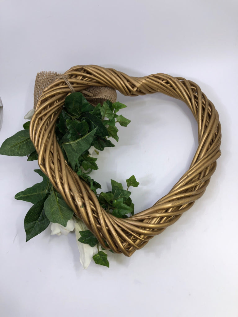 WOODEN HEART WREATH W/WHITE FLOWERS.