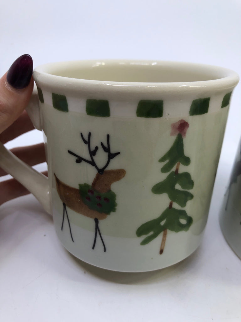 2 HEAVY REINDEER MUGS.