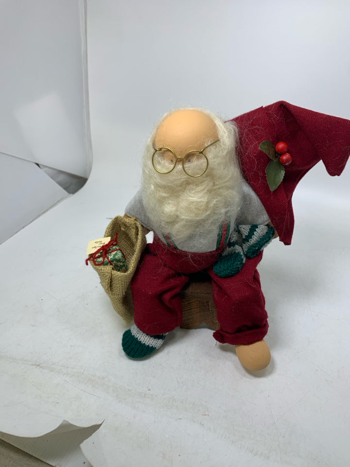WOOD SANTA SITTING ON CHAIR W/ BURLAP SACK LIZZIE HIGH DOLLS.