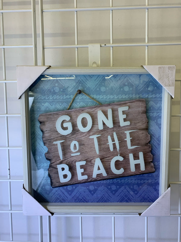 "GOING TO THE BEACH" IN WHITE FRAME.