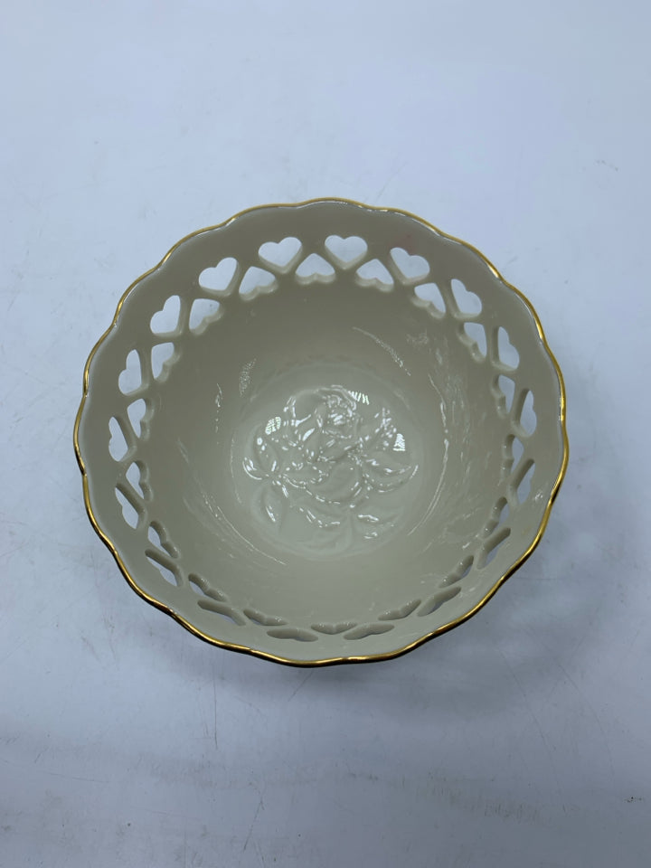 PORCELAIN PIERCED HEART CUTOUTS W/ EMBOSSED ROSES INSIDE CANDY DISH.