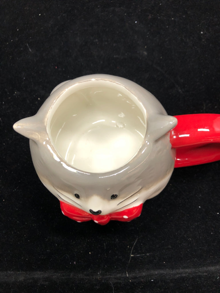 GREY/WHITE CAT MUG W/ RED BOW.