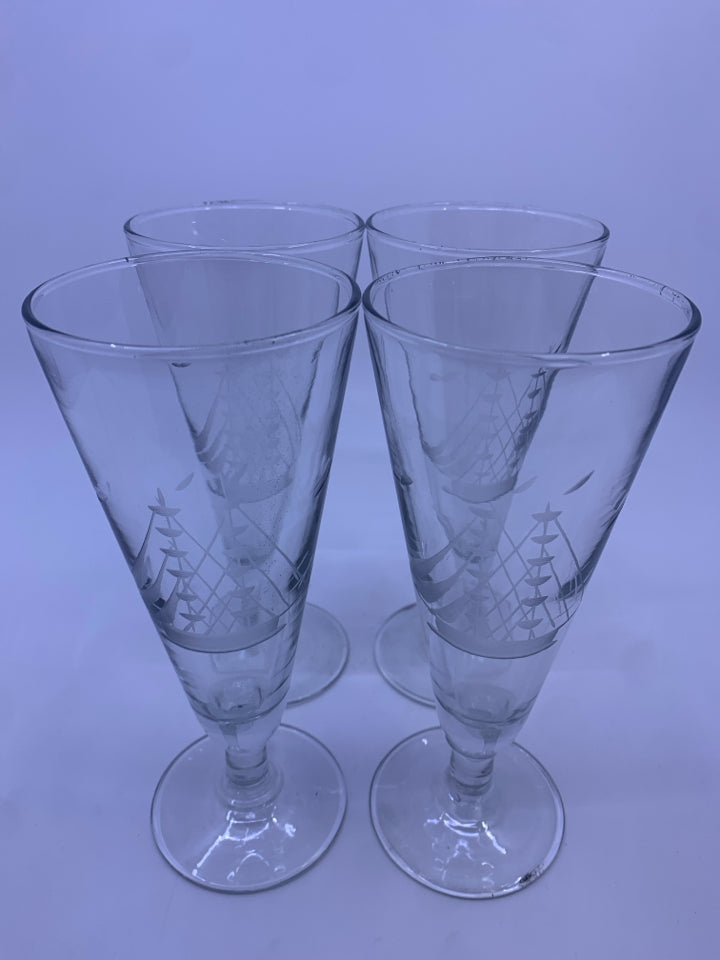 4 TALL FOOTED GLASSES W/ SAIL BOATS.