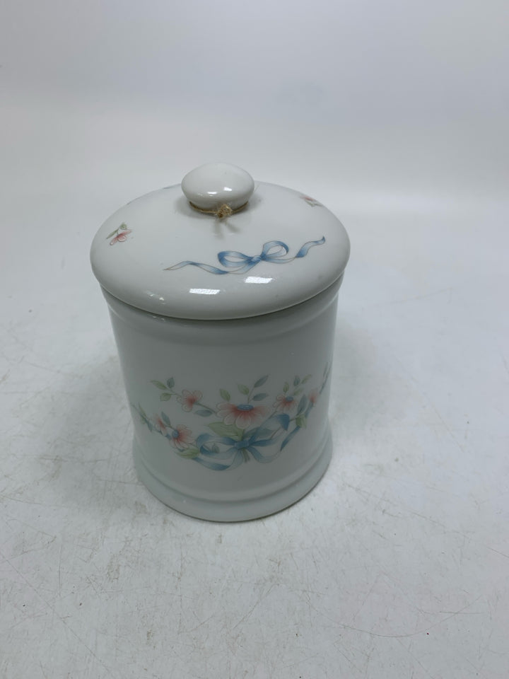 SMALL PORCELAIN CANISTER W/ PAINTED FLOWERS/BOWS.
