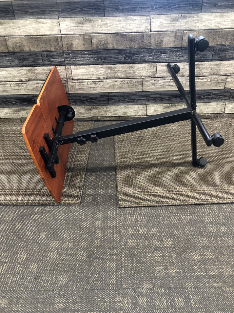 ADJUSTABLE FAUX WOOD DESK.