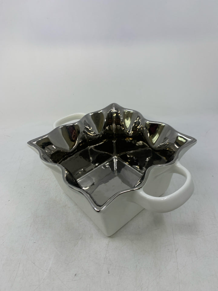 WHITE SQUARE BOWL W/ SILVER INSIDE RUFFLED EDGE HANDLES.