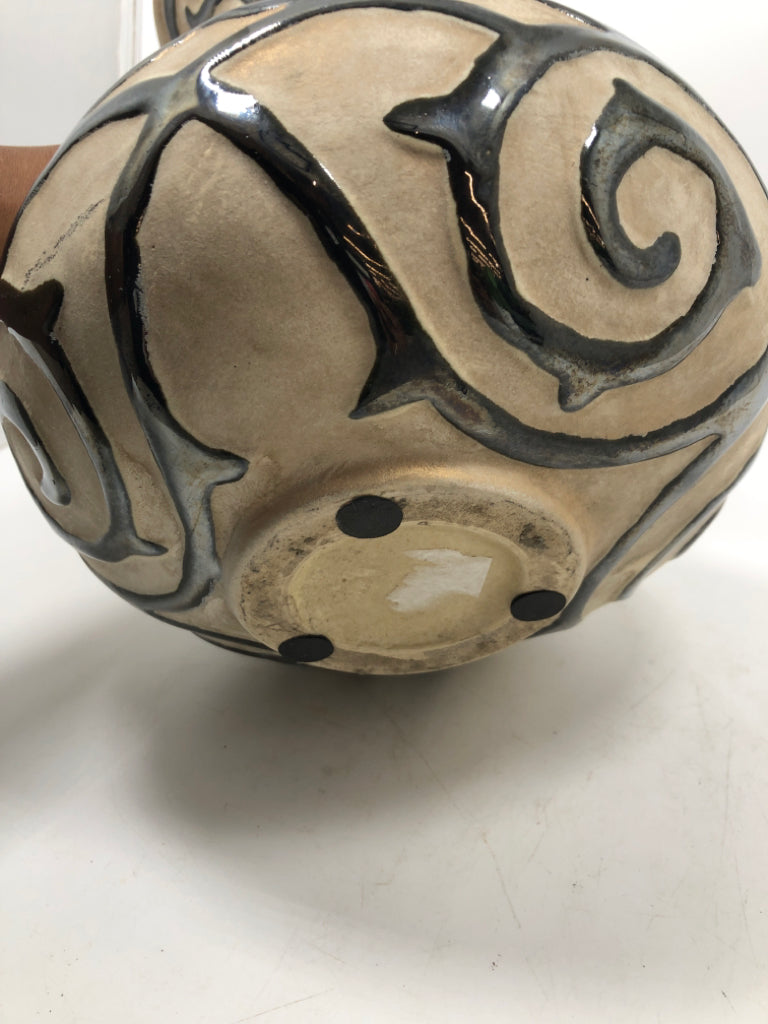BLACK SWIRLED STONEWARE VASE.
