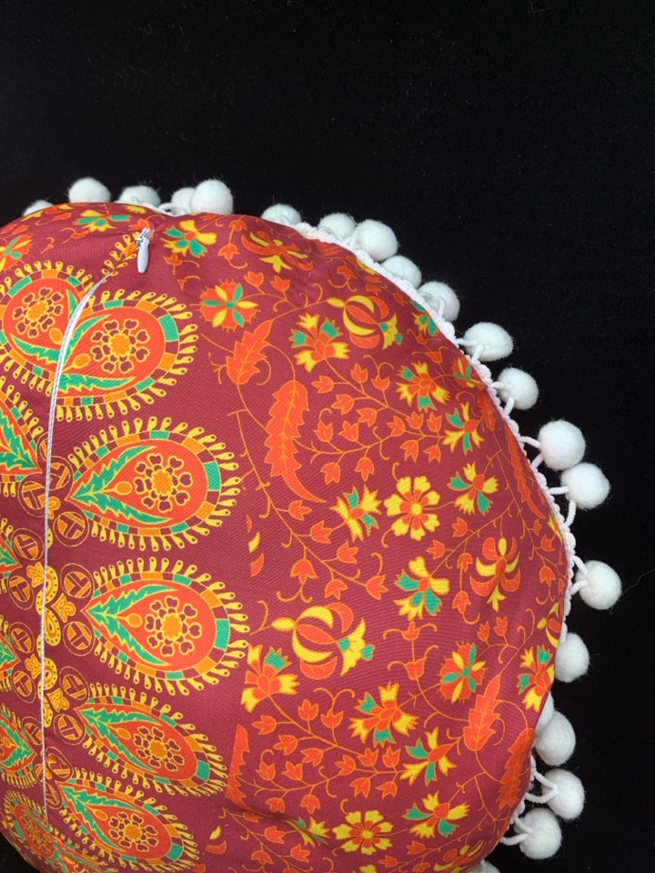 RED FLORAL ROUND ACCENT W/WHITE POM POMS.