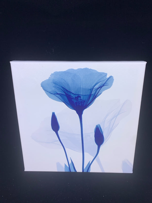 SINGLE BLUE FLOWER W/ TWO FLOWERS BUDS CANVAS WALL HANGING.