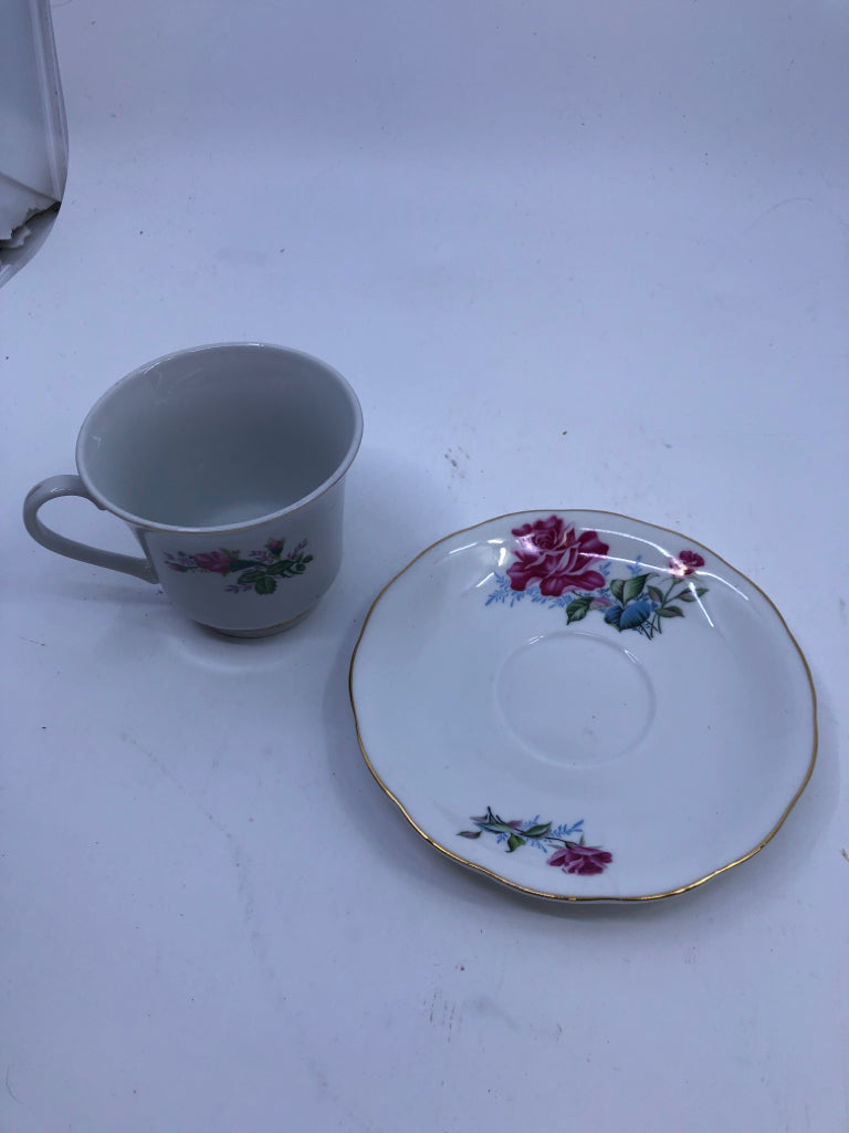 PINK, BLUE ROSE TEACUP AND SAUCER.