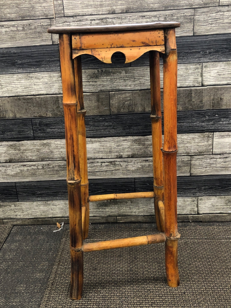 TALL BAMBOO PLANT STAND W/BLUE FLORAL TOP.