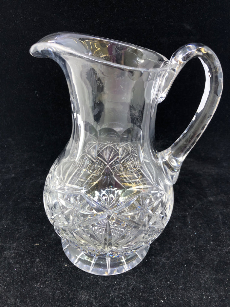 HEAVY CUT CRYSTAL FOOTED PITCHER.