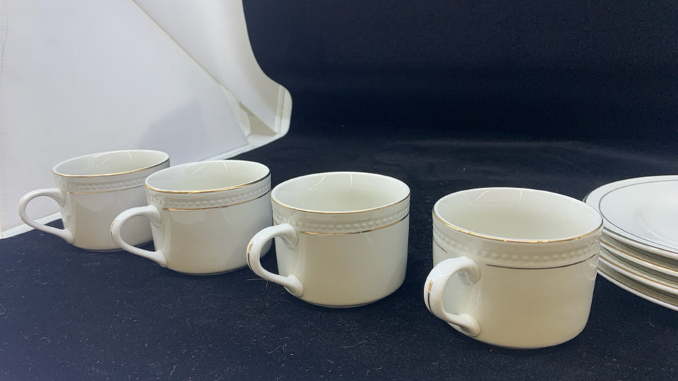 4 CREAM CUPS + SAUCERS- CREAM W/GOLD RIM.