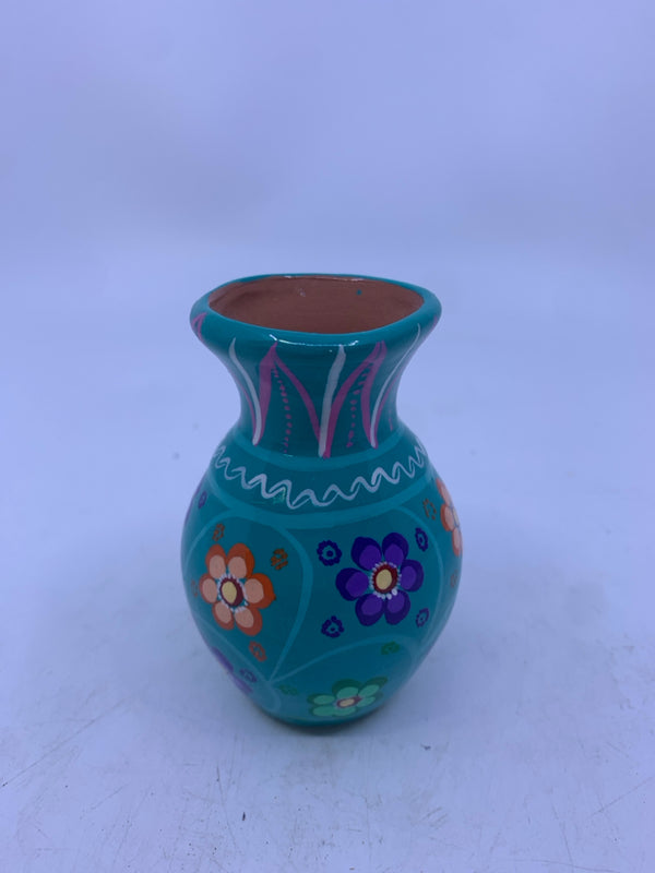 SMALL TEAL TERRA COTTA VASE W/ COLORFUL FLOWERS.