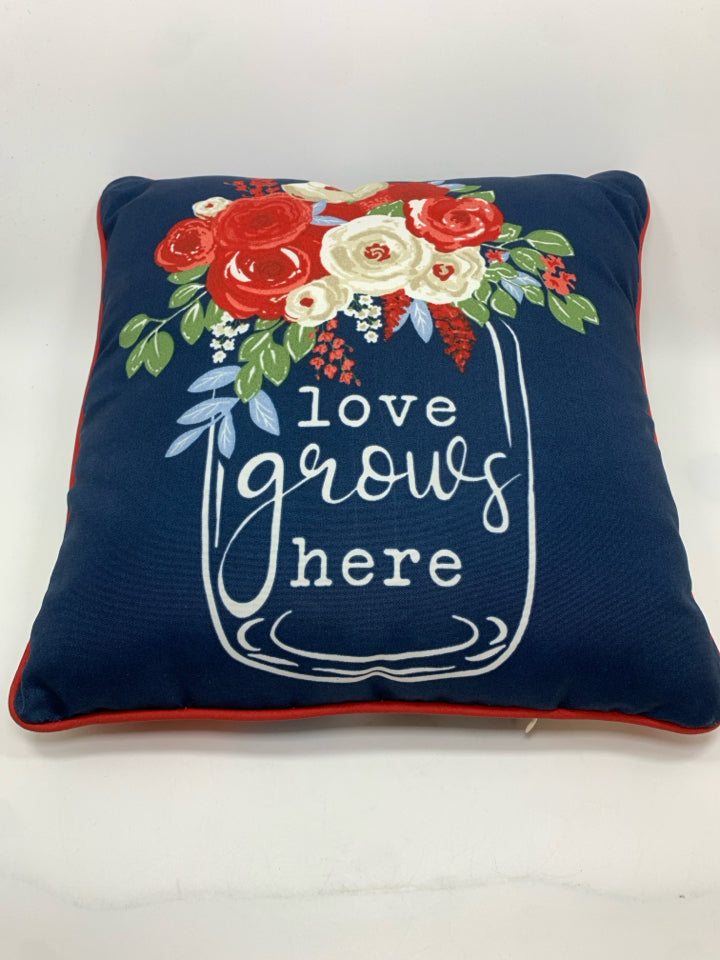 LOVE GROWS HERE BLUE PILLOW.