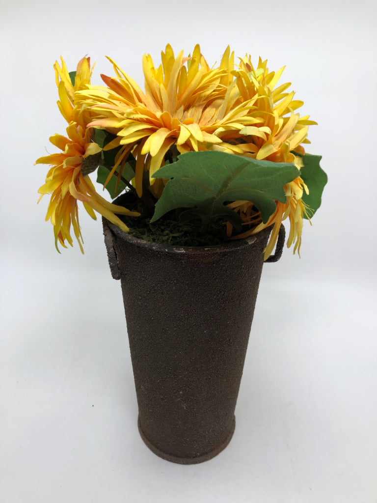 FAUX SUNFLOWERS IN PRIMITIVE METAL PLANTER.