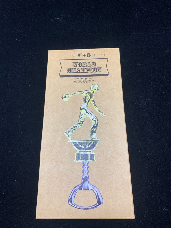 NIB WORLD CHAMPION BOTTLE OPENER.