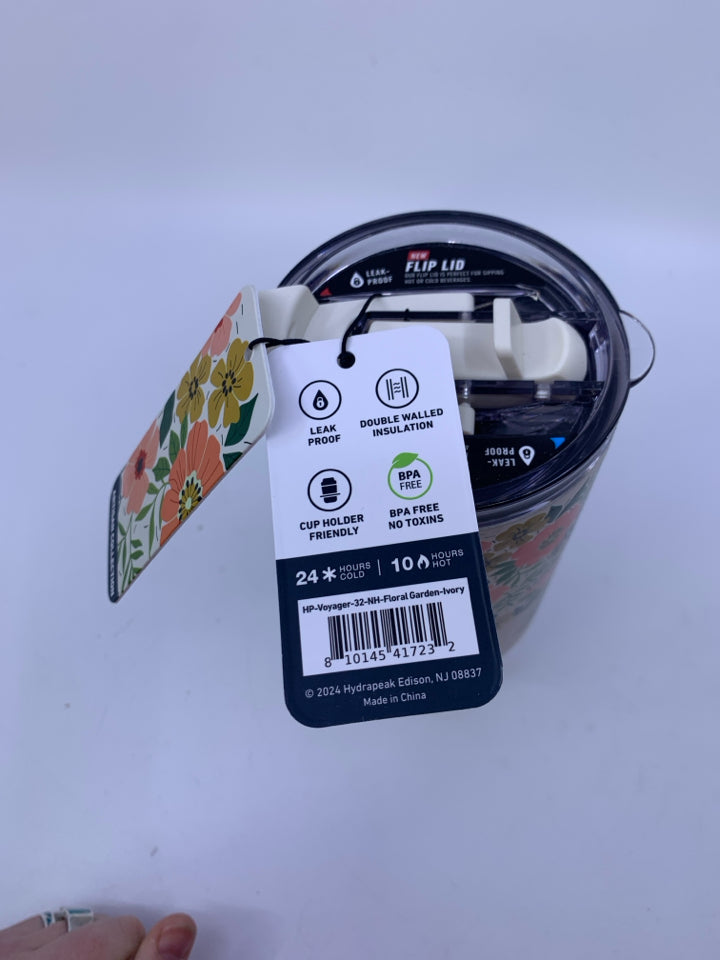 NEW CREAM FLORAL HYDRAPEAK WATER BOTTLE.