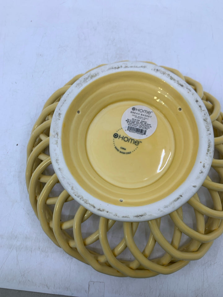 FOOTED YELLOW CERAMIC BASKET CIRCLE.