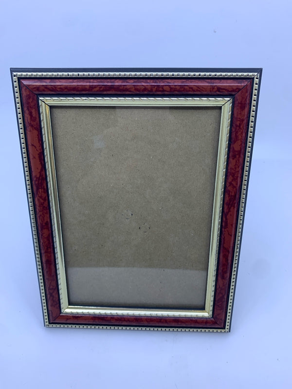 RED AND GOLD PICTURE FRAME.