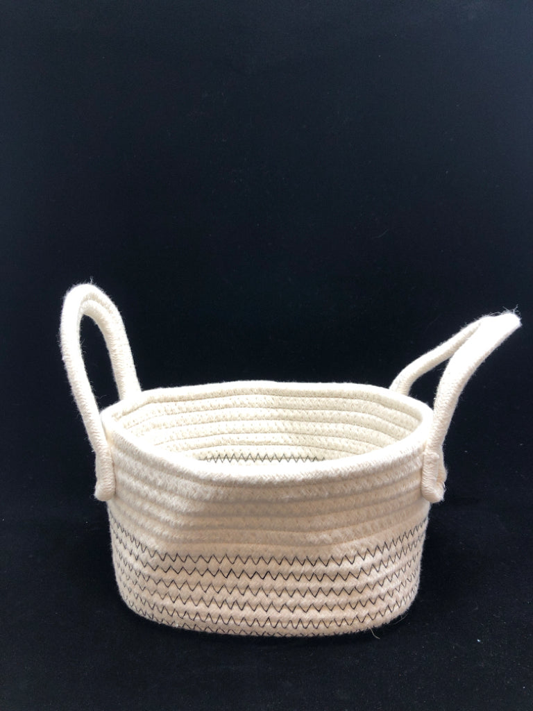 WHITE OVAL FABRIC BIN W/HANDLES.